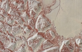 Illustration for article titled New, Insanely High-Resolution Pluto Images Include More Color—and Weird "Snakeskin" Textures